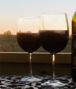 Wine Glasses at Sunset at Rocky Comfort Cabins