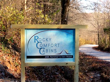 Rocky Comfort Cabins Sign