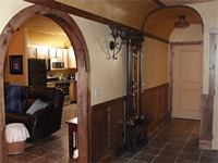 The barrel vault hallway. The bathroom is down the hall, to the right