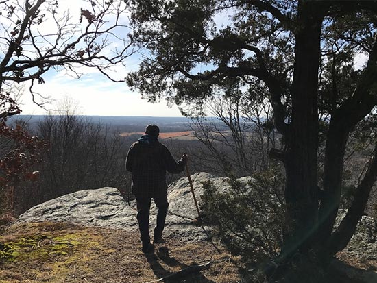 Hiking in winter at Stone Face Bluff overlooking Shawnee Forest