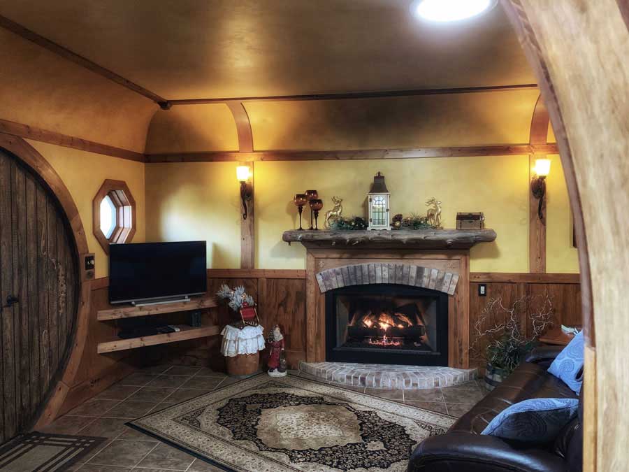 Image of round door and fireplace.