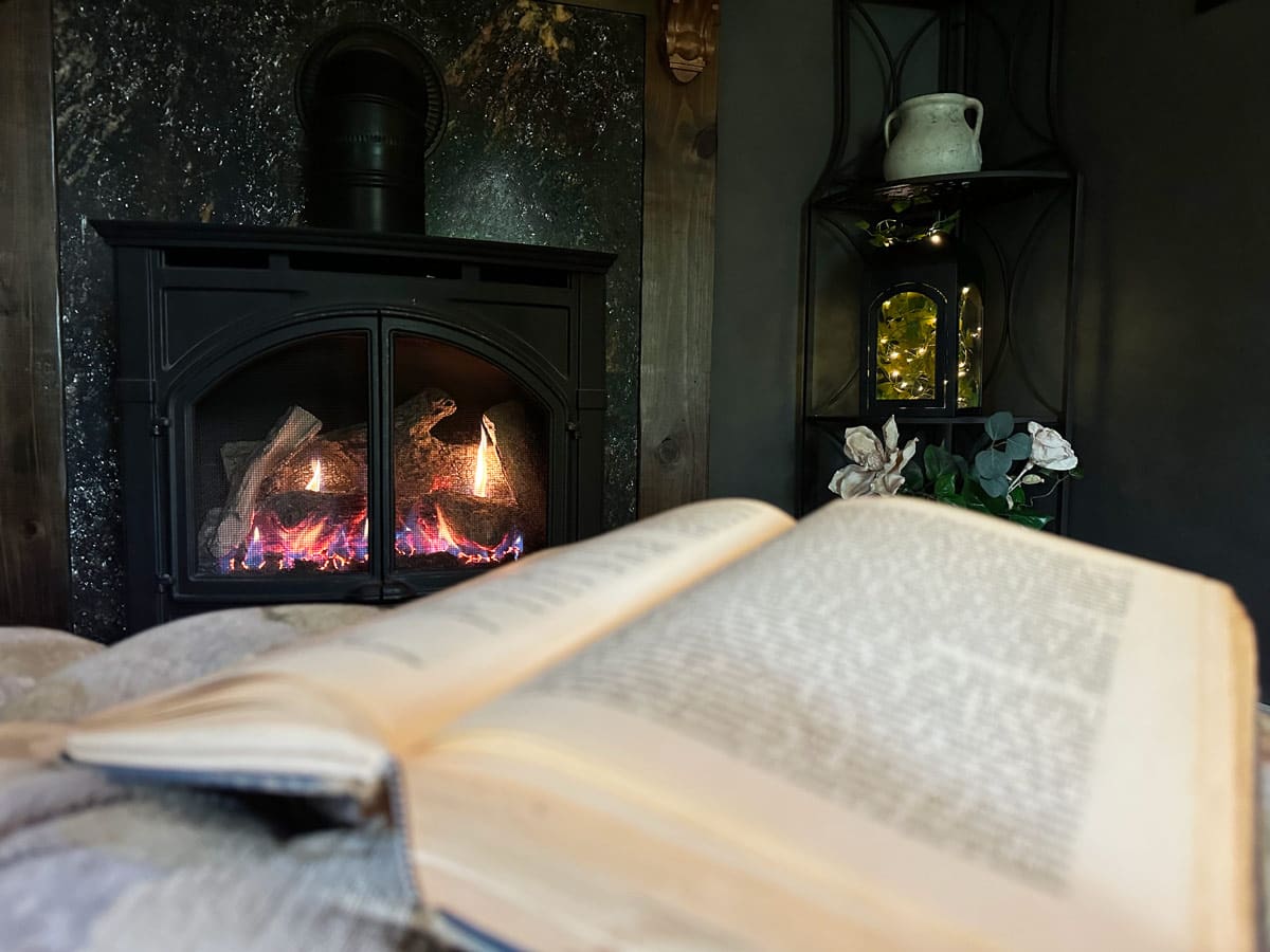 Open book close to glowing stove